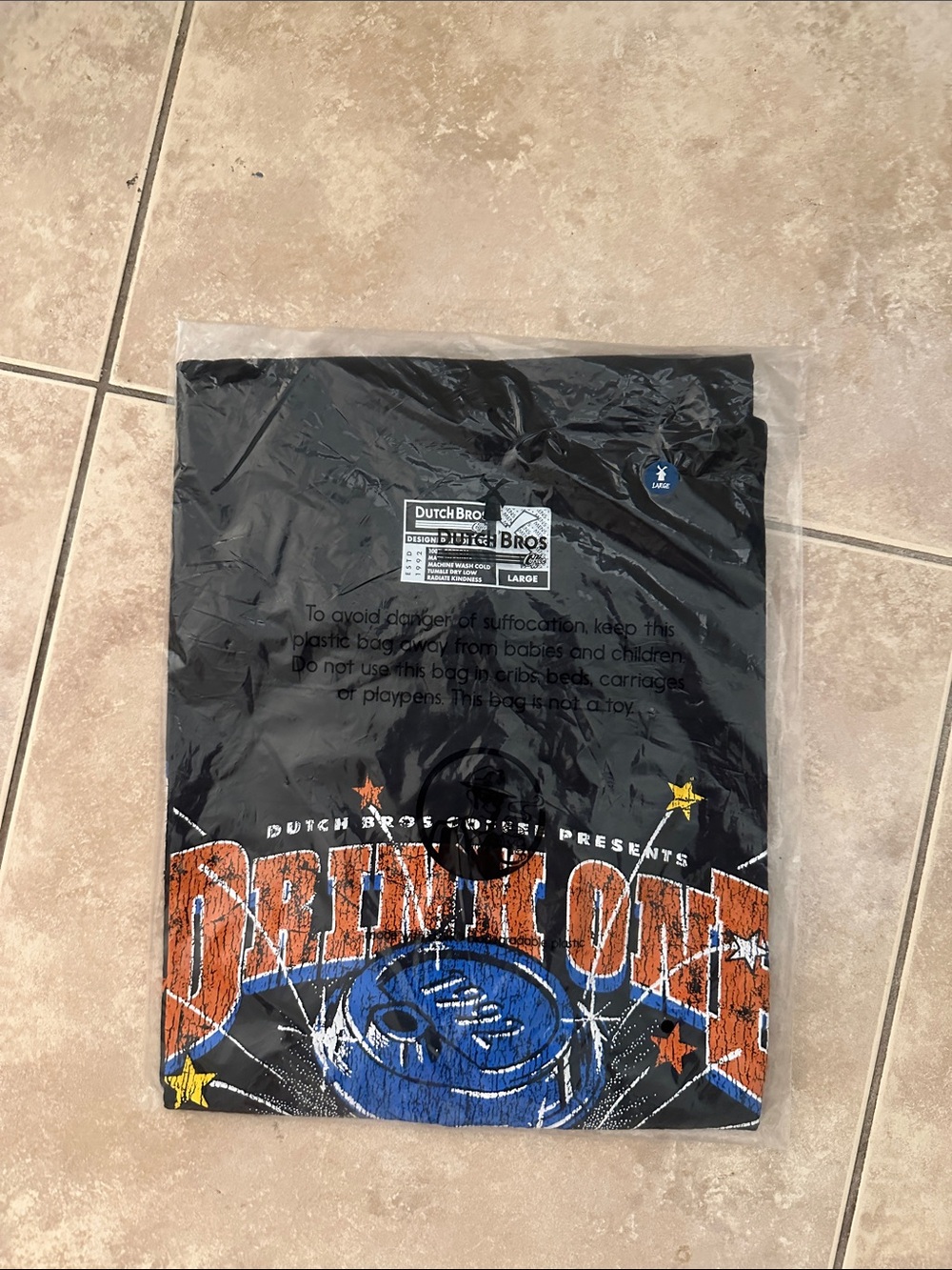 Dutch Bros Black Tee with Orange and Blue 'Drink One' Graphic